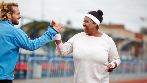 high five after workout image